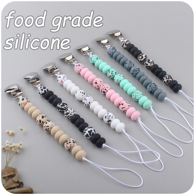 Nuevo bebé suministros de hierro redondo chupete clip creativo bebé calmante leopardo cuentas de silicona mordedor chupete cadena anti-gota cadena