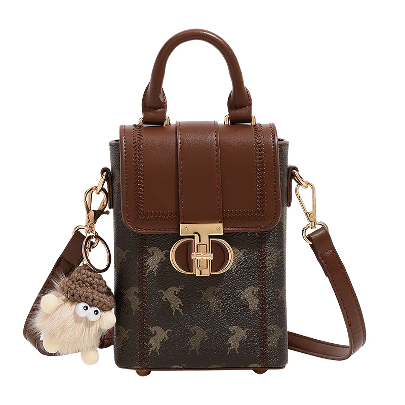 Otoño y invierno mini bolso de mujer 2026 nuevo nicho de hombro pequeño bolso de hombro de alto nivel bolso de mano pequeño bolso de teléfono móvil