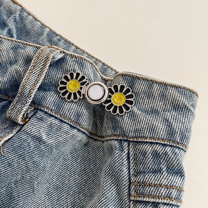 Pantalones de jeans de cintura, botones de cintura ajustados, botones ajustables fijos