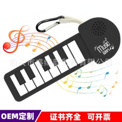 国境を越えたアマゾンミニ白黒ピアノギター初心者入門電子ピアノ音楽キーホルダー楽器玩具