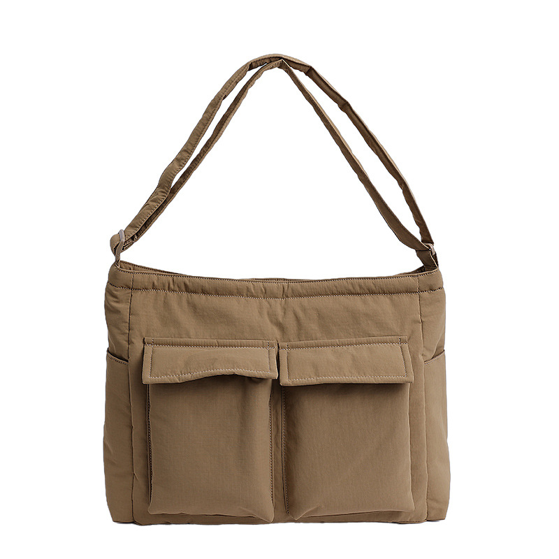 Bolsa de lona de explosión de comercio exterior para mujeres 2025 nuevo viaje multibolsillo bolso de gran capacidad para trabajar mochila de hombro