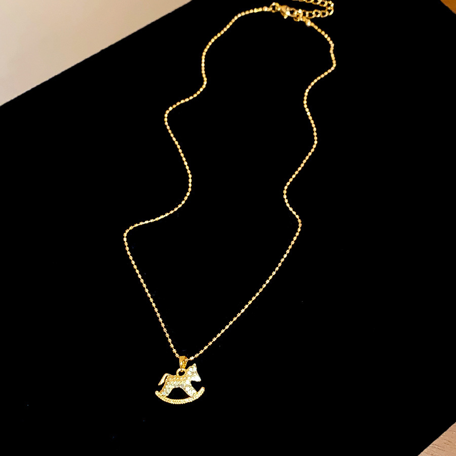 Oro verdadero eléctrico galvanis colgante de piedra pony pendientes collar ligero lujo nicho universal conjunto temperamento alta sensación de joyería mujer