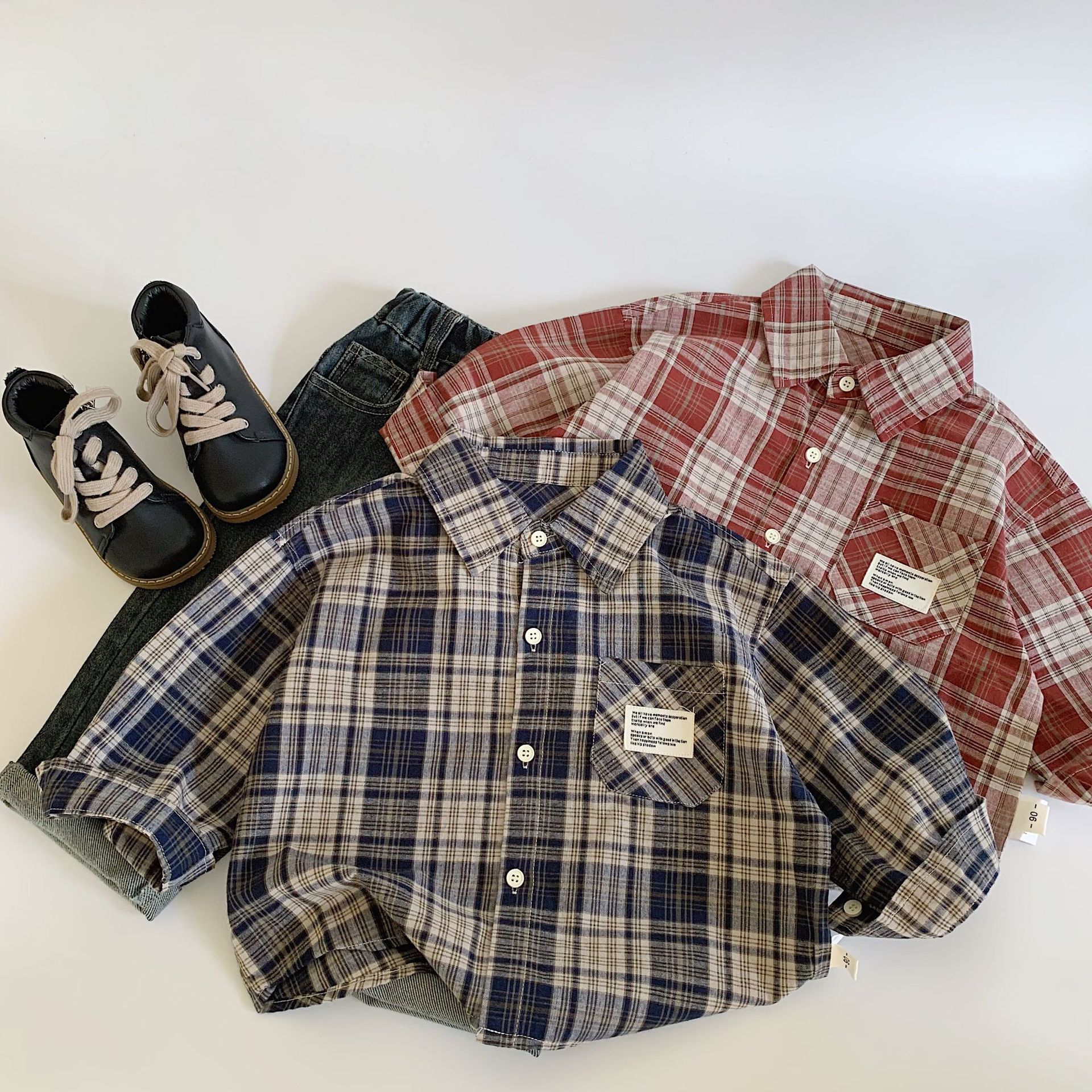 Camisas infantiles Mai Bao 2025 primavera y otoño nuevos productos de algodón para niños cuello cuadrado camisa de manga larga chaqueta de aire extranjero bebé