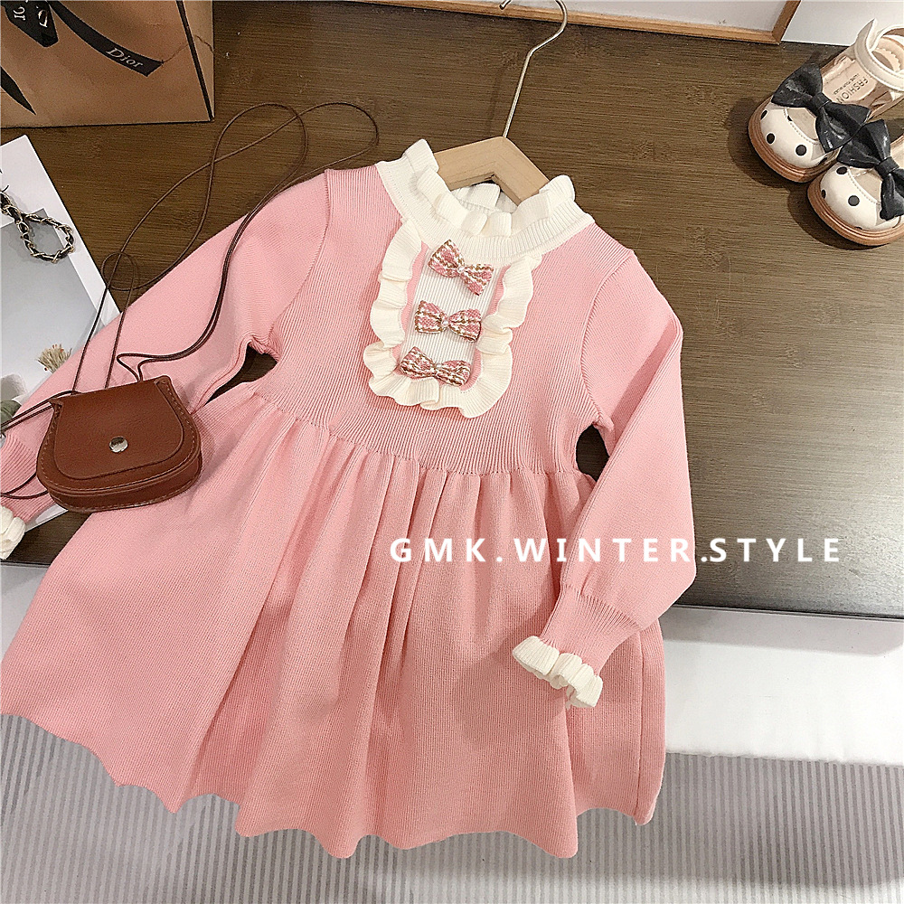 Fuchsia woolen dress with bow