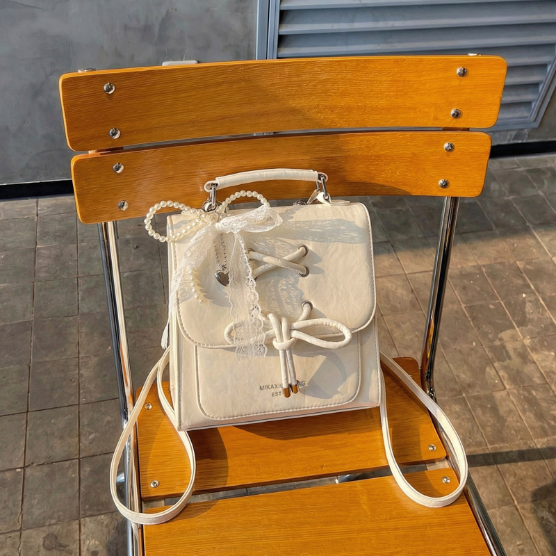 Bolso portátil para mujeres 2026 primavera / verano estilo coreano simple mochila casual nicho sensación cotidiana de moda mochila pequeña image 1