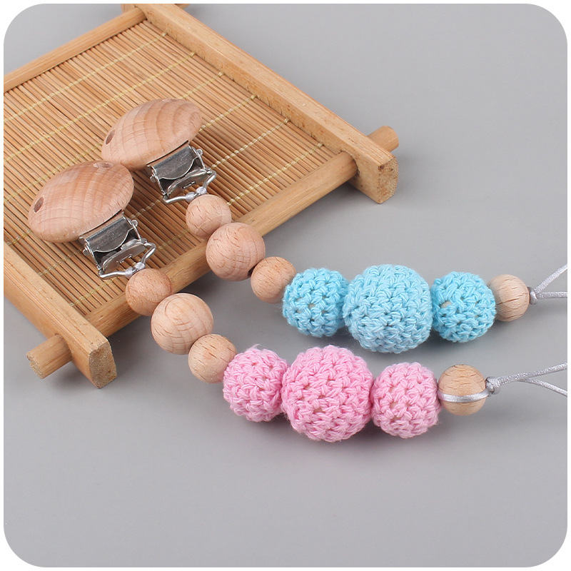 Productos para bebés y niños abrazadera de beech para apaciguar bebés bola de lana de madera tetina cadena de cadena de Amazon AliExpress