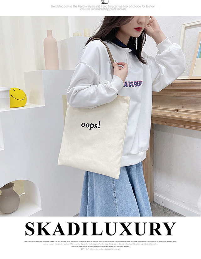 The 2022 new trendy women's canvas bag, a retro and cute student ulzzang canvas bag for women undefined