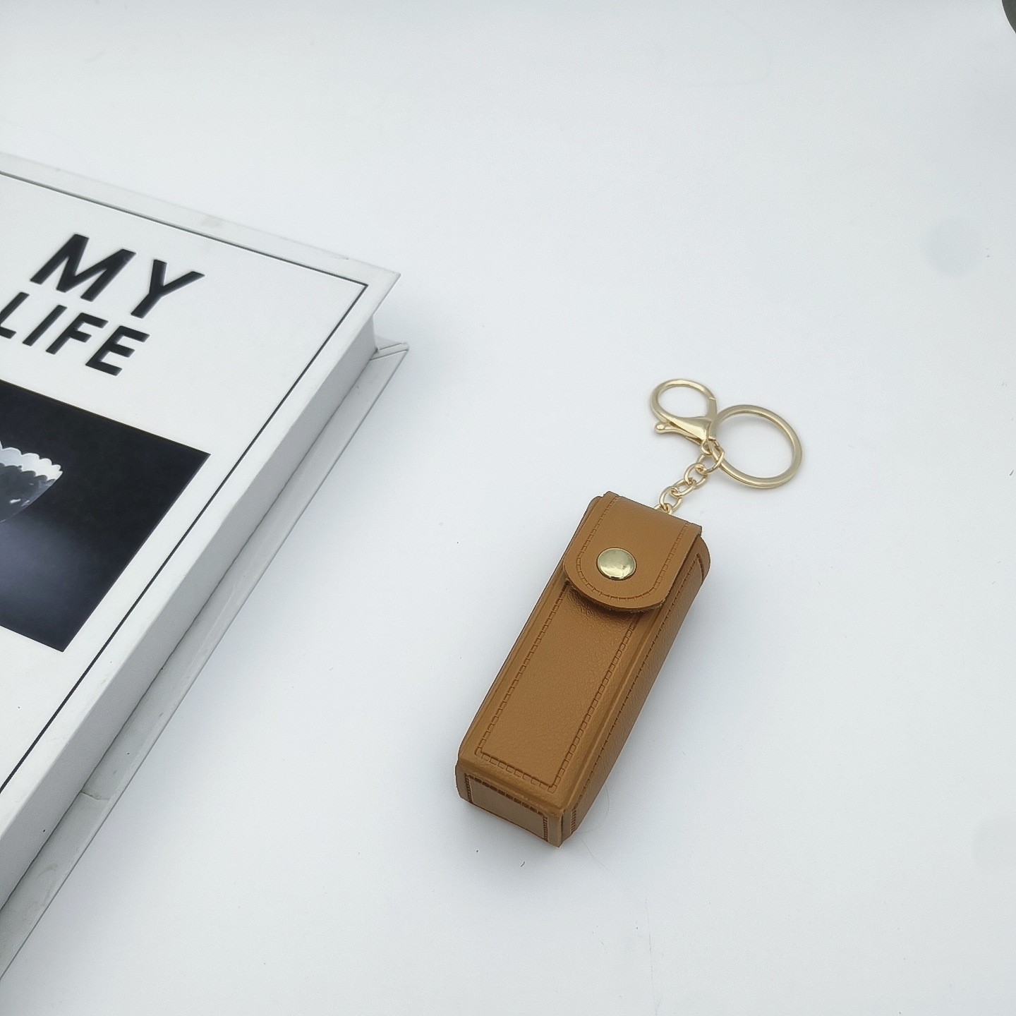 Bolso de cambio transfronterizo sobre rojo espejo creativo llavero colgante pequeño PU cuero bolso de coche accesorios accesorios en stock