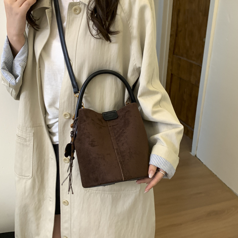 Cross-border 2025 invierno nuevo retro bolso de lona de seda bolso de cubo bolso de hombro de alta calidad para mujeres bolso de transporte