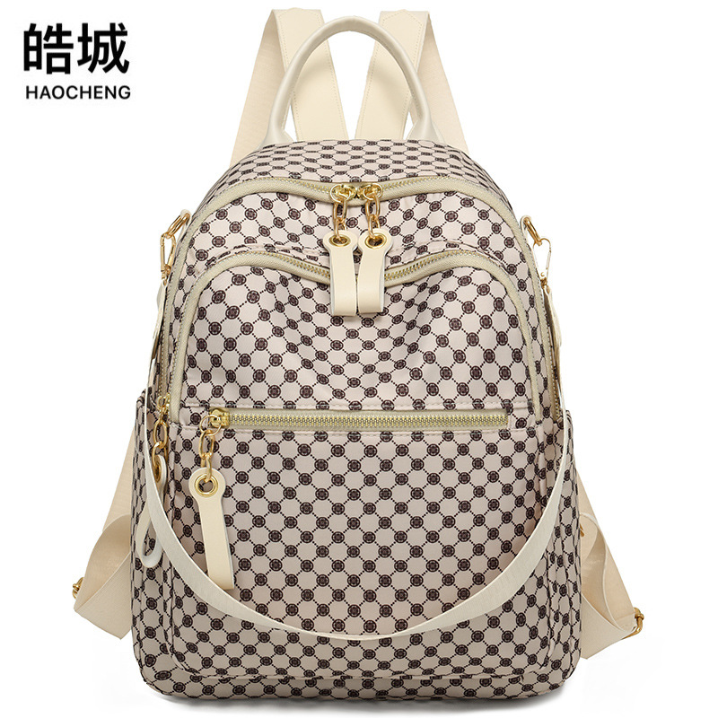 Nueva mochila de mujer de tela Oxford de comercio exterior, casual y versátil, multifunción de tres usos, mochila de viaje, mochila escolar, marea