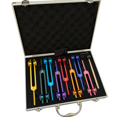 A set of colored tuning forks 126.22 136.1 141.27 172.06 194.18 210.42 221.23 om