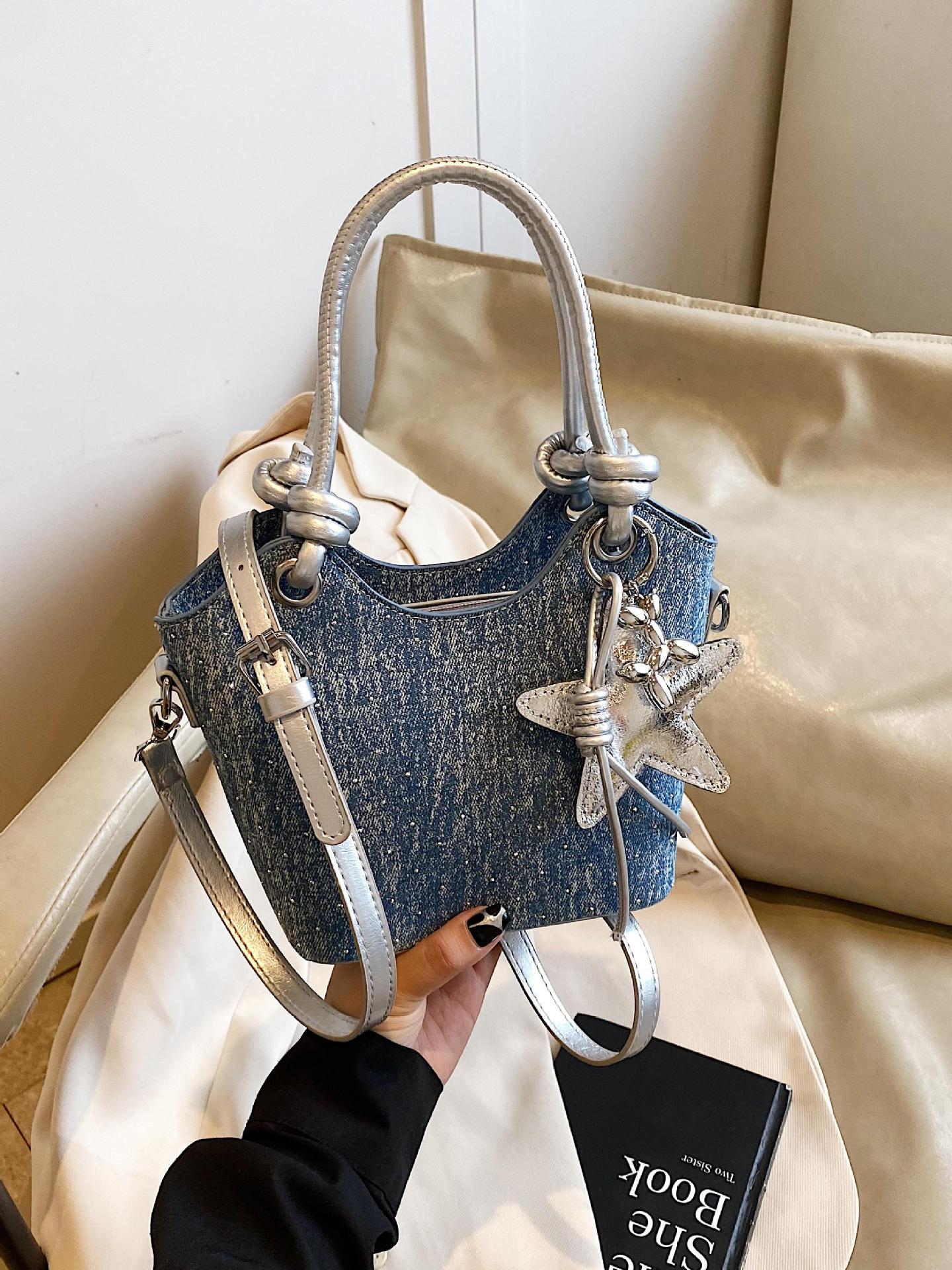 Bolsa de mano de moda coreana de estilo extranjero, bolso de mano de mujer, verano 2025, nuevo estilo universal, bolso de cubo de moda, bolso de hombro de viaje