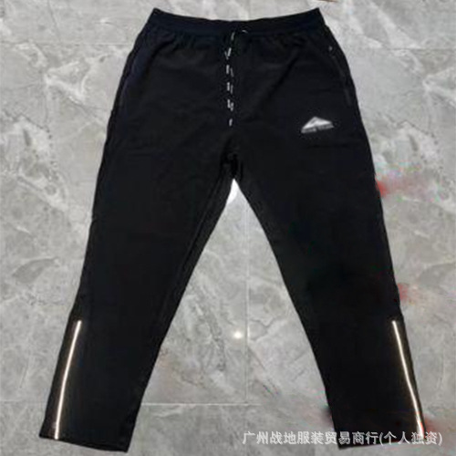 Explosión transfronteriza de un tipo idéntico de tecnología de prevención de tres secado rápido tela casual tela cremallera deportiva de protección solar pantalones de hombre