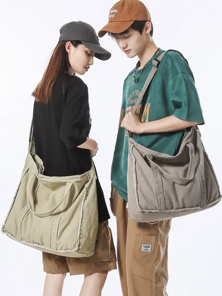 Japanese retro shoulder bag women's large capacity personalized frayed canvas bag student schoolbag artistic casual messenger bag men