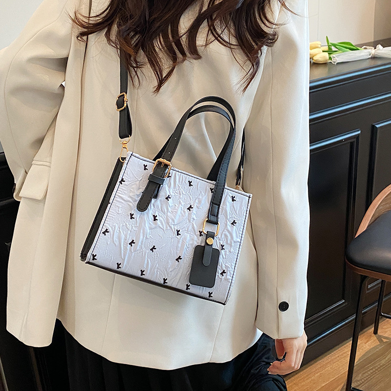 クロスボーダー新スタイルリボンプリントトートバッグ大容量ファッショナブルな質感シングルショルダー脇の下バッグ学生通勤バッグ女性|undefined