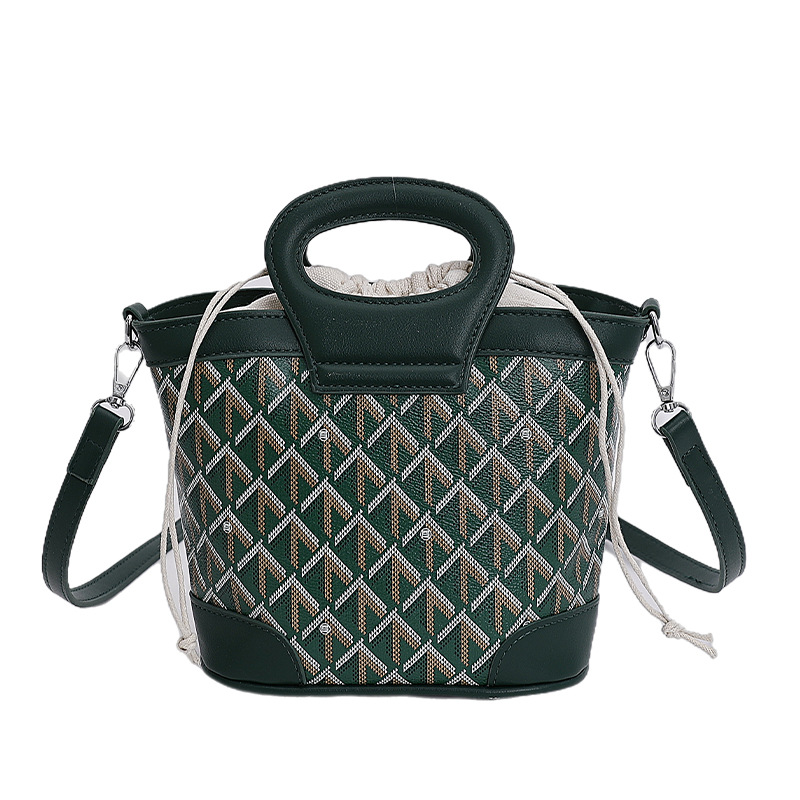 Bolsa de cubo de tela coreana para mujeres 2025 nueva moda transfronteriza nicho de alta calidad bolso de hombro