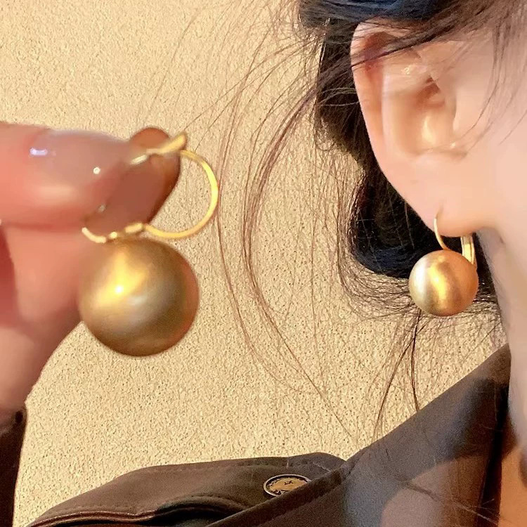 925 aguja de plata estilo de Hong Kong retro pendientes de metal pendientes de anillo liso geométrico de alto grado de las mujeres pendientes exagerados del viajero del todo-fósforo
