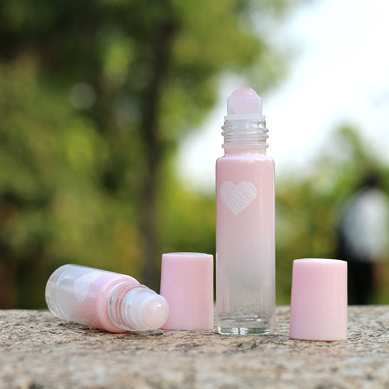 5ml10ml amor perla polvo esencial aceite bola rodillo botella Rosa cristal grano perfume sub-embalaje botella de vidrio Jade bola