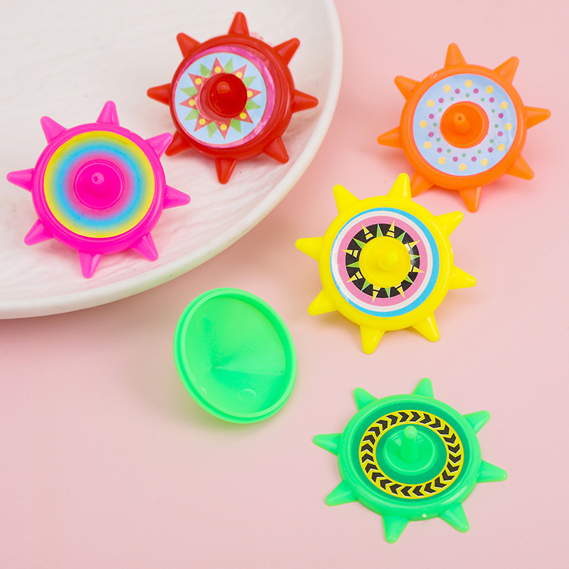 Yiwu fábrica de tierra octogonal torneado de plástico para niños pequeños juguetes niños y niñas mano torciendo pequeño gyro kindergarten regalo