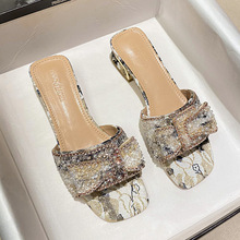 Wearing slippers for women in summer, with a fairy style and trendy Instagram style, featuring a vintage rhinestone print on the heel. These slippers are suitable for women in sizes 41-43