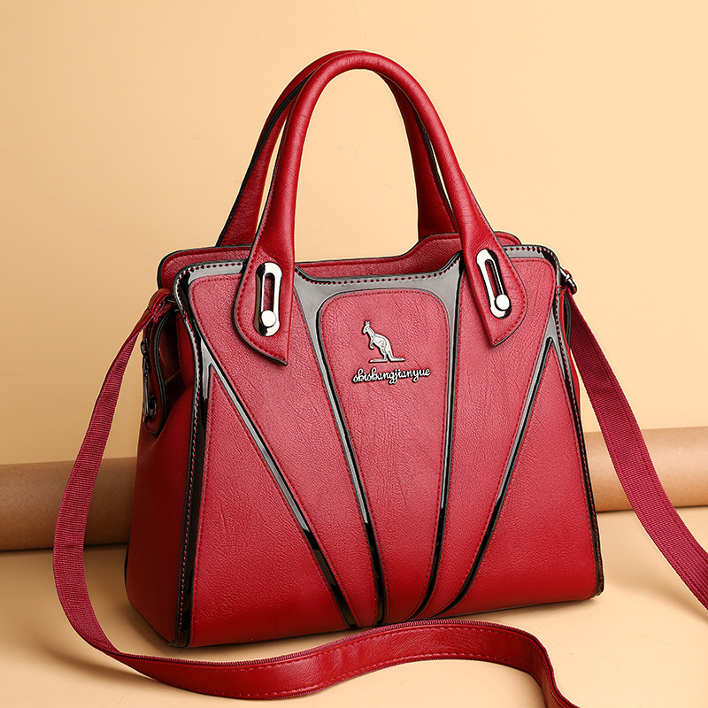 Fashion kangaroo bag women's new Korean style fashionable high-grade Pu women's bag shoulder messenger handbag middle-aged mother bag Fashion kangaroo bag women's new Korean style fashionable high-grade Pu women's bag shoulder messenger handbag middle-aged mother bag