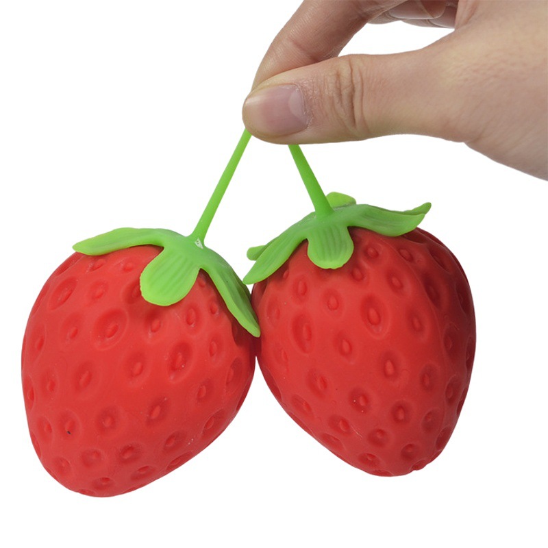 Artefacto de descompresión de fresa chica truco pellizco música descompresión ventilación bola simulación fruta extraño gadget