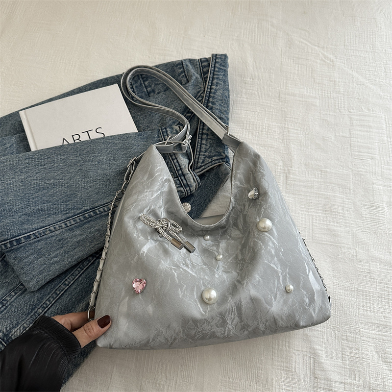 Mochila de diseño de nicho, mochila de hombro, mochila multipropósito, bolsas de cadena de alta capacidad.