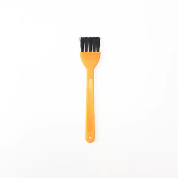 Small yellow brush