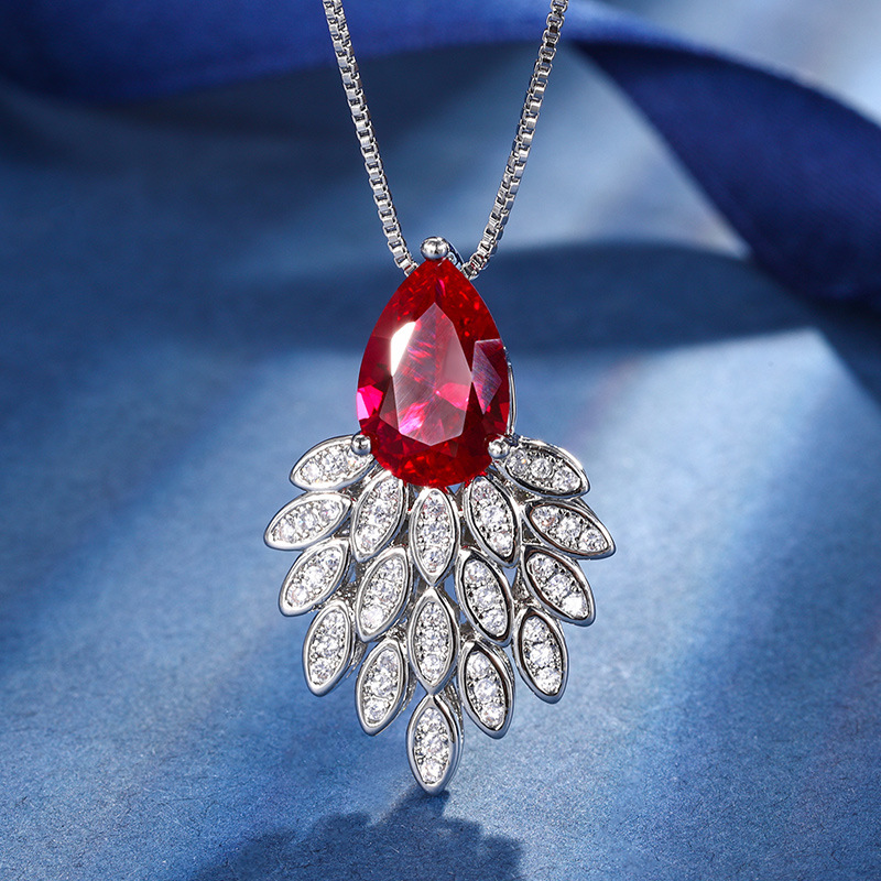 2024 nuevo estilo Zhuang Sheng joyería cobre inferior chapado en oro moda simulación color tesoro corindón temperamento colgante traje femenino 8*12