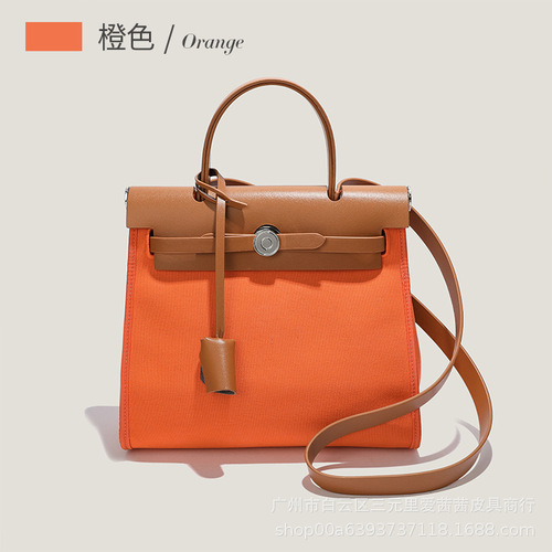 New niche herbag Kelly bag canvas shoulder portable crossbody bag high-end commuter tote genuine leather women's bag
