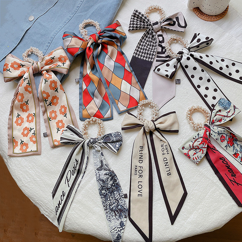 Banda de pelo de bufanda de seda para mujer corbata de pelo fino de verano de perlas cinta de arco Hada cuerda de pelo de todo fósforo estilo coreano accesorios para el cabello al por mayor