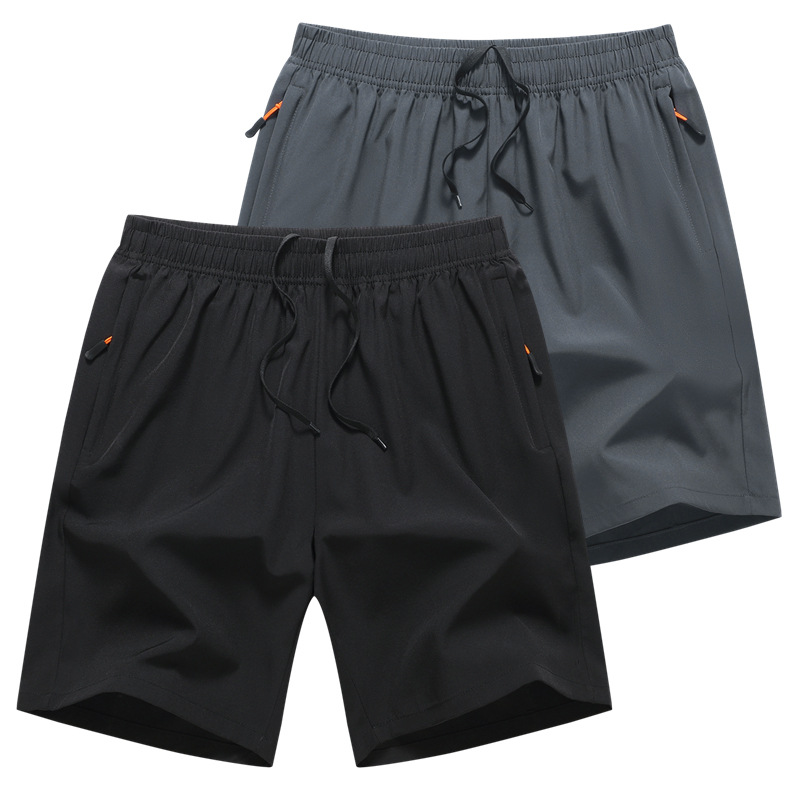 Pantalones de verano sueltos para hombres delgados versátiles 5 pantalones cortos casuales grandes pantalones cortos transpirables secos rápidos mayoristas