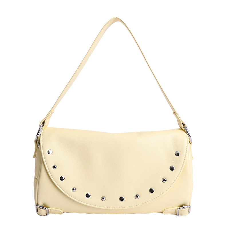 Texturas de moda primavera y verano retro bolsas de brazo 2026 nuevo estilo de este año popular remaches de hombro bolsas de tramo inclinadas