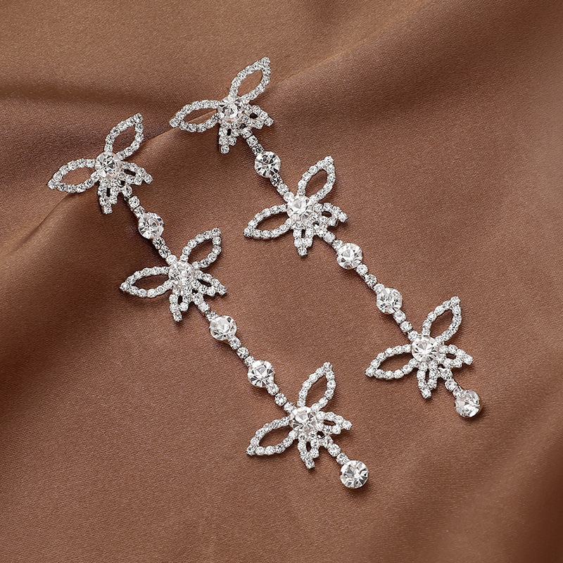 Pendientes de borla de mariposa con aguja de plata y diamantes