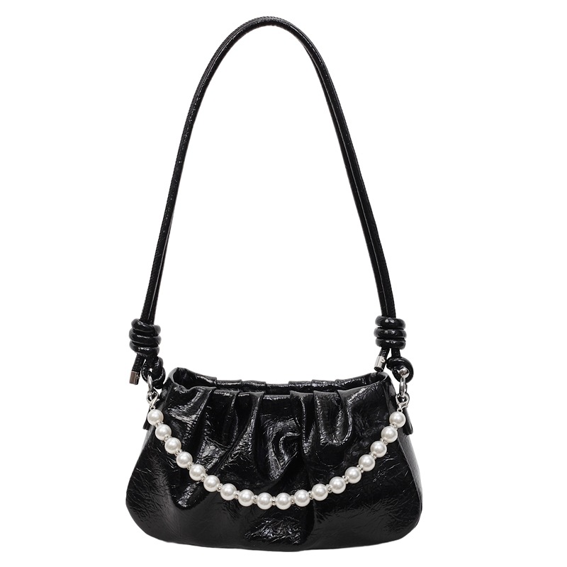 Bolsa de nube plegable de comercio exterior para mujeres 2025 nueva bolsa de brazo de aire extranjero versátil alta sensación de mochila de viaje