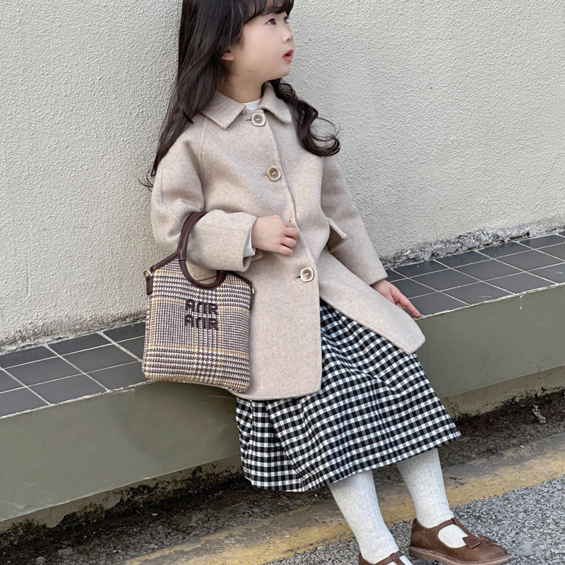 Bolso de niña con estampado de leopardo de moda versión coreana del bolso de mensajero para niños a cuadros de estilo occidental marea 2025 nuevo bolso de hombro para niños