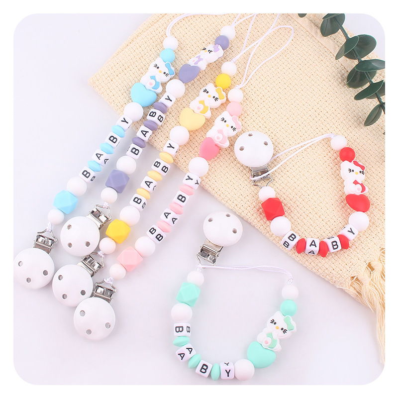 Bebé blanco tetina clips juguetes KT gatos silicona tetina cadena cadena de cadena Aliexpress Amazon explosión