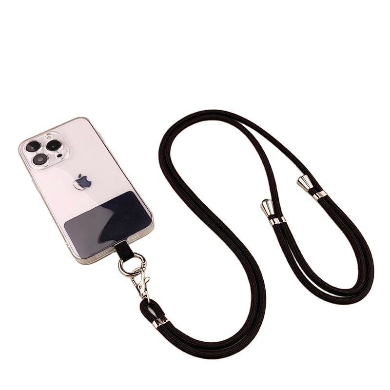 携帯電話のストラップの首が斜めにまたがっています。|undefined