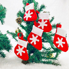 クリスマスの装飾品クリスマスの雪の靴下の小さいペンダントはナイフのフォークのカバーのミニの小さい靴下の食器のカバーの小さい靴下を飾ります。
