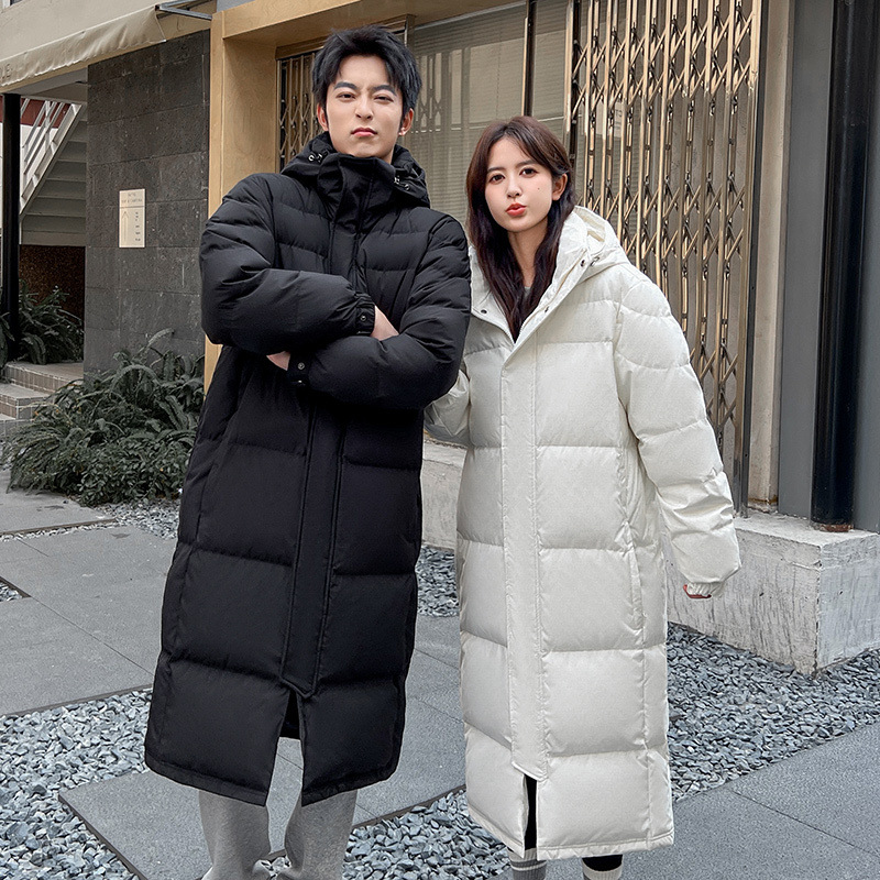Chaqueta negra transfronteriza hombre y mujer super larga rodilla gruesa chaqueta de plumón de invierno de 2025 pareja traje