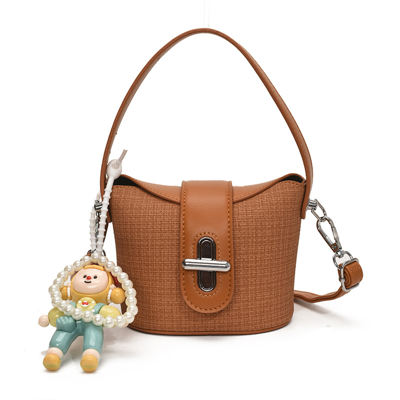 Bolso de hombro para niña de moda, muñeca linda, bolso de bebé colgante, nuevo mini bolso para niños 2025