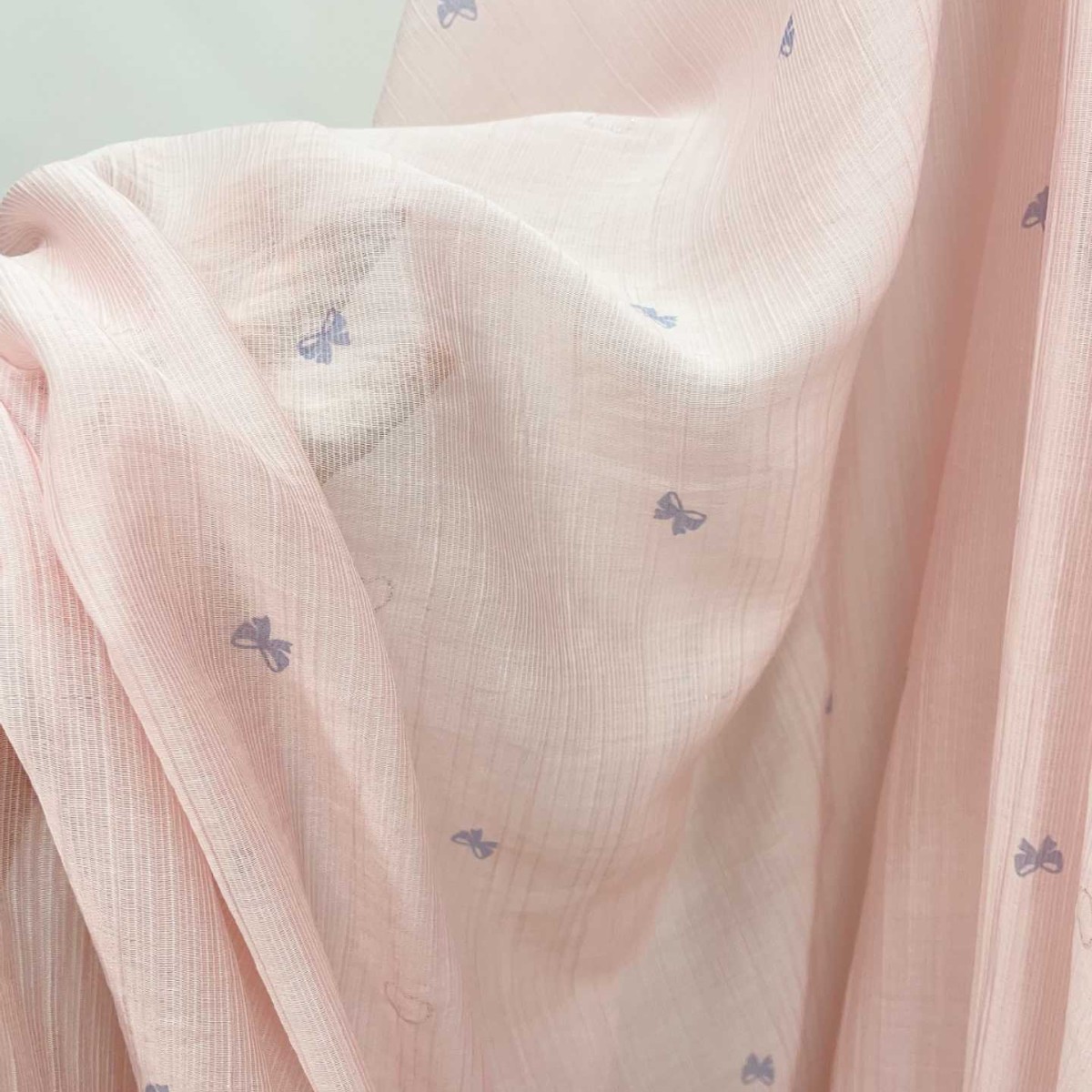 流行时尚浪漫粉红天丝牙签条黑蝴蝶结印花透气轻薄亲肤连衣裙面料