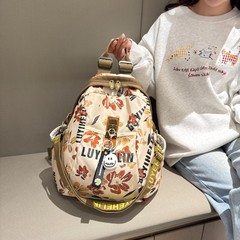 トレンドプリントの女性バッグ三用カジュアルなランドセル2025の新型の衝突色は大容量のシングルショルダーバッグです。