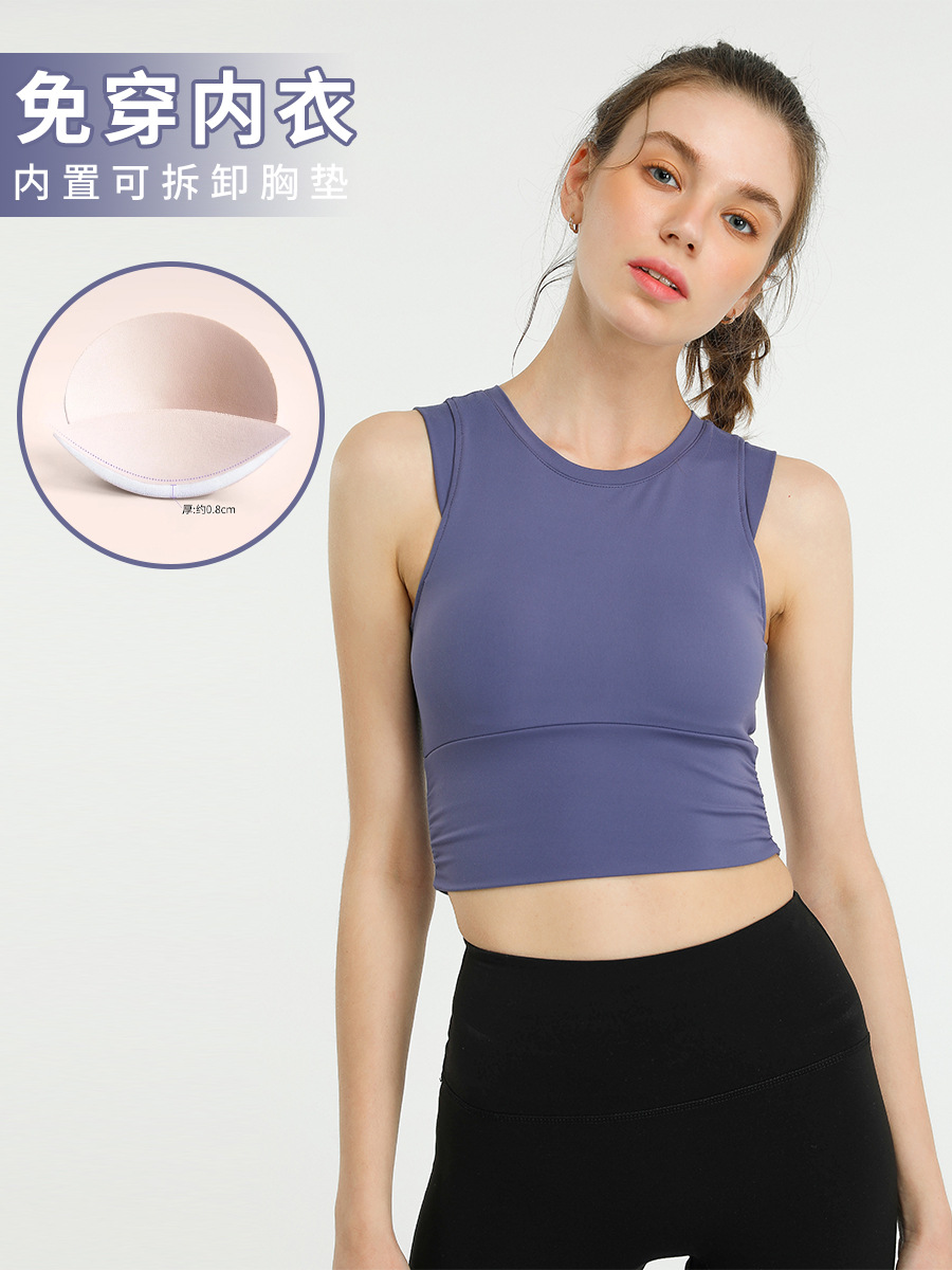Apretado europeo y americano transfronterizo nueva ropa de yoga deportes a prueba de golpes de las mujeres corriendo entrenamiento de fitness Chaleco de secado rápido con almohadilla en el pecho