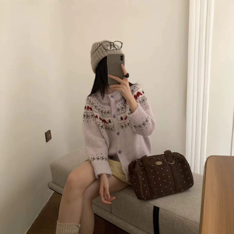 Nordic-style Fair Isle knitted sweater with berry and cherry pom-pom embellishments, round neckline, vintage-inspired sweater coat