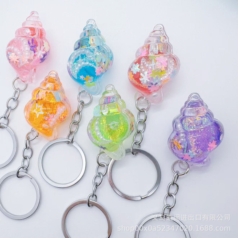 Creative Oil-Filled Small Conch Keychain, Cute Liquid Quicksand Pendant, Bag Accessory, Small Gift Pendant Wholesale Creative Oil-Filled Small Conch Keychain, Cute Liquid Quicksand Pendant, Bag Accessory, Small Gift Pendant Wholesale