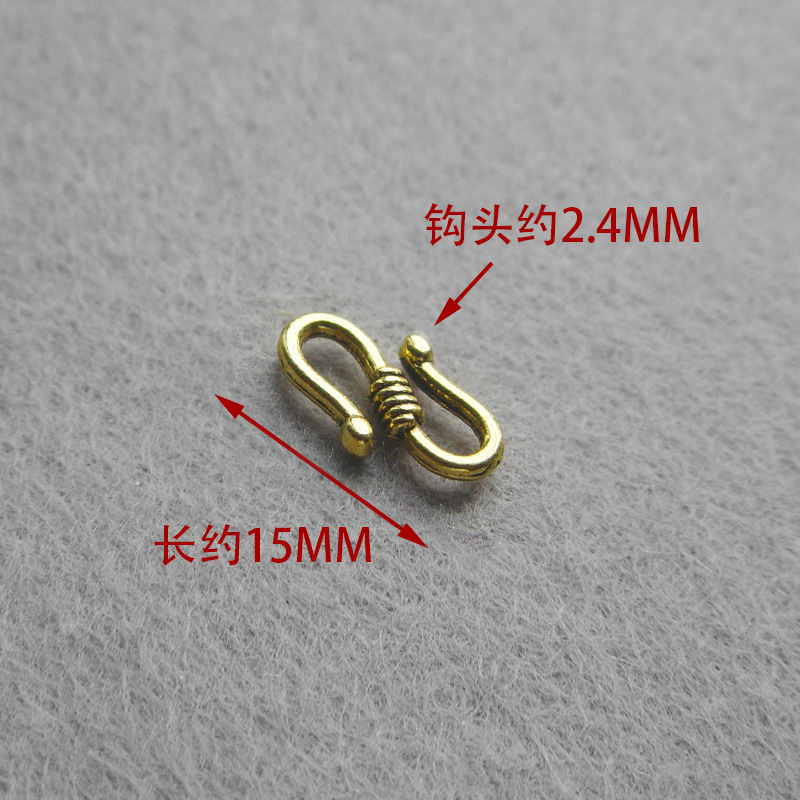 Ancient gold alloy S buckle.jpg