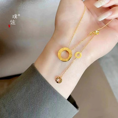 Puzuo Gold Shop の同じスタイルの女性用 24K ブライト ゴールド リング タッセル ネックレス、ガールフレンド用のコールド スタイルのリバーシブル鎖骨チェーン