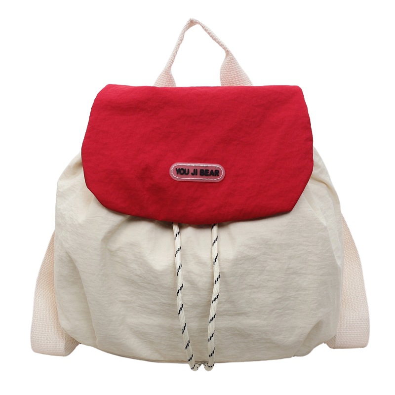Bolsa de nylon ligera de moda para mujeres 2025 nueva moda versátil estilo coreano para estudiantes universitarios viajes mochila de hombro