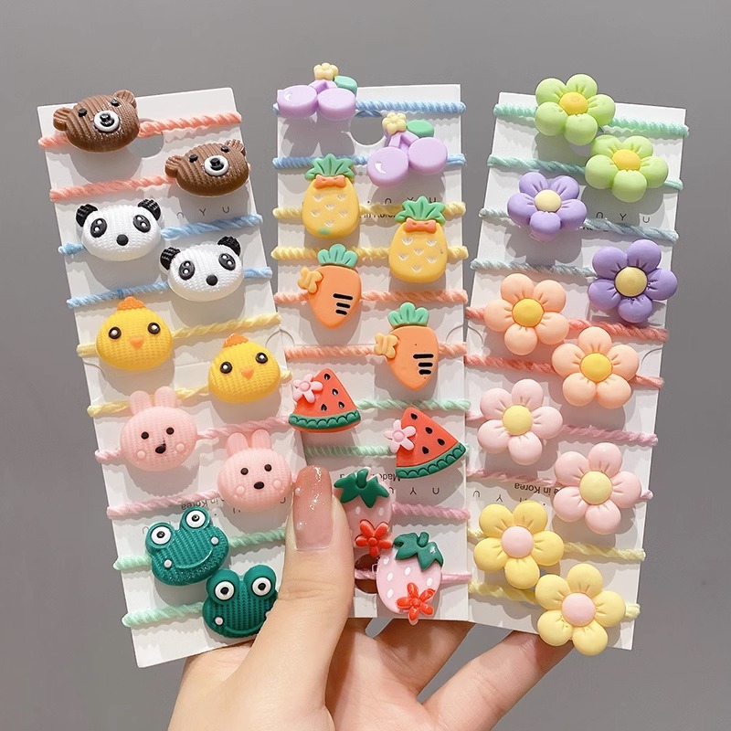 La cuerda del pelo del bebé de las muchachas de la banda de goma de los niños no lastima el pelo Los accesorios del pelo del pulgar del tamaño pequeño atan la banda de goma del pelo